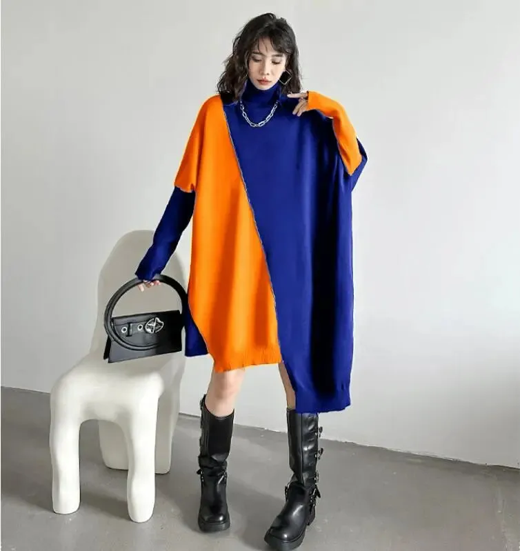 Stylish winter sweater dress with long bat sleeves and color block design